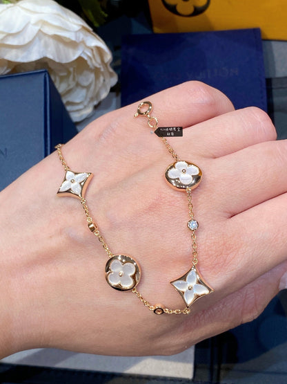 [Kismet Jewels ]STAR AND SUN 4 MOTIF WHITE MOP PINK GOLD BRACELET